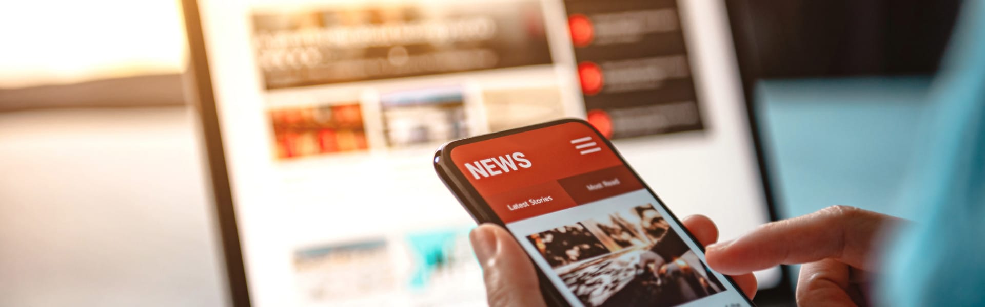 header-news-adobe-express News auf dem Smartphone